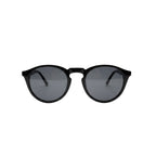 Óculos de sol redondos preto com lentes escuras, design moderno e elegante para uso diário.