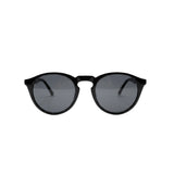 Óculos de sol redondos preto com lentes escuras, design moderno e elegante para uso diário.