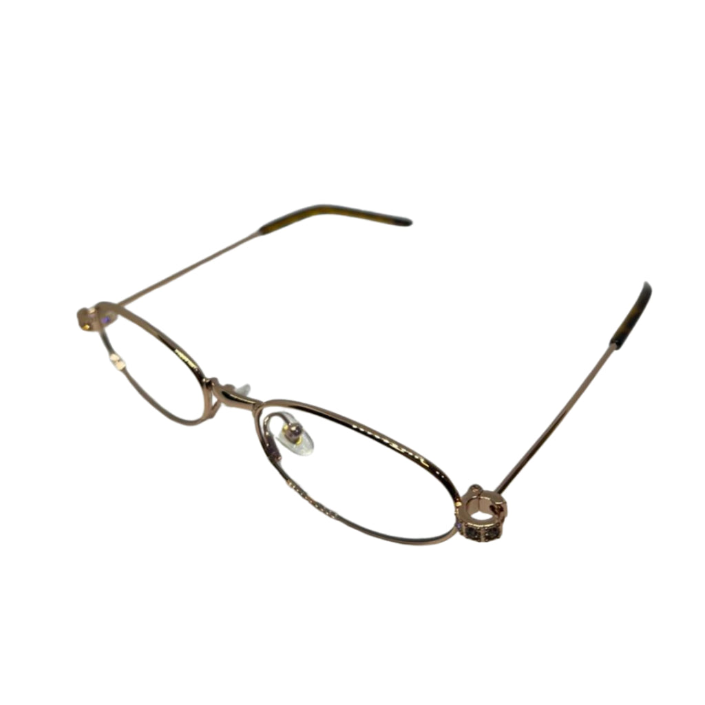 Óculos de grau feminino com armação dourada e detalhes brilhantes