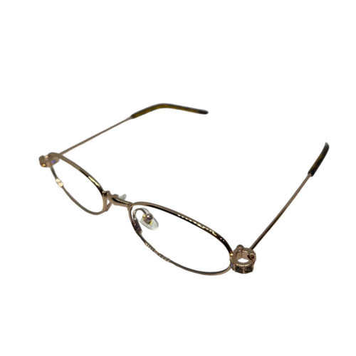 Óculos de grau feminino com armação dourada e detalhes brilhantes